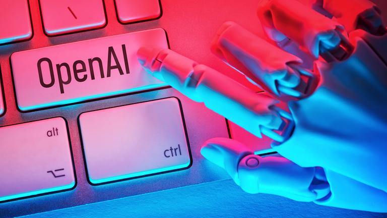 oboterhand drückt Taste mit Aufschrift OpenAI auf einer Computertastatur