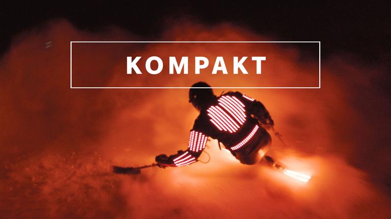 Wintersport "KOMPAKT"- Logo vor Monoskifahrer