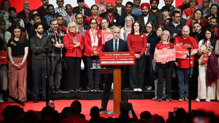 Canadian Prime Minister and Liberal Leader Mark Carney speaks to volunteers and supporters during the Canada Strong Election Night event in Ottawa