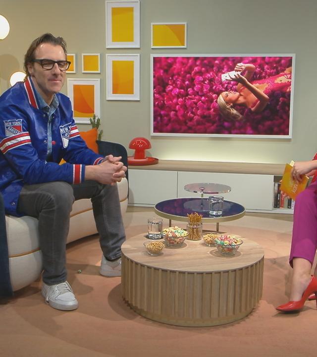 Patrick Lipke und Nadine Krüger sitzen sich gegenüber