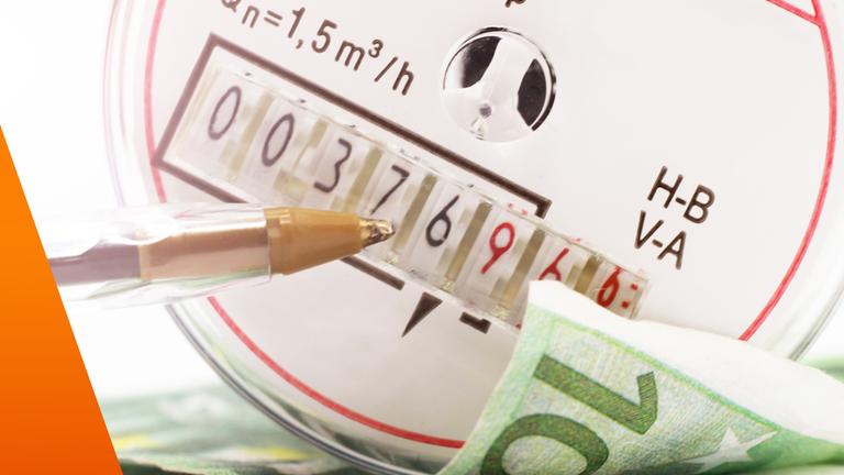 Geldschein mit Zähler für Heizkosten