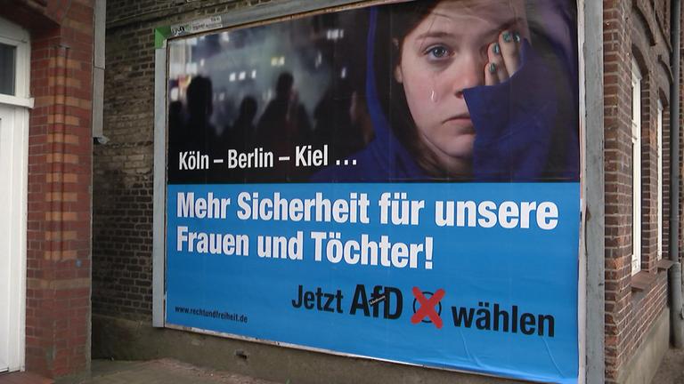 Wahlplakat der AfD von 2016; Text: Mehr Sicherheit für unsere Frauen und Töchter