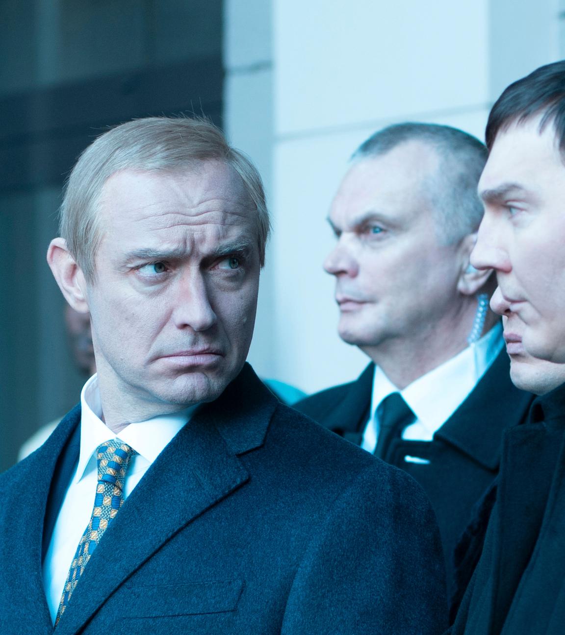 This image shows Jude Law, as Vladimir Putin, left, and Paul Dano, as Vadim Baranov.