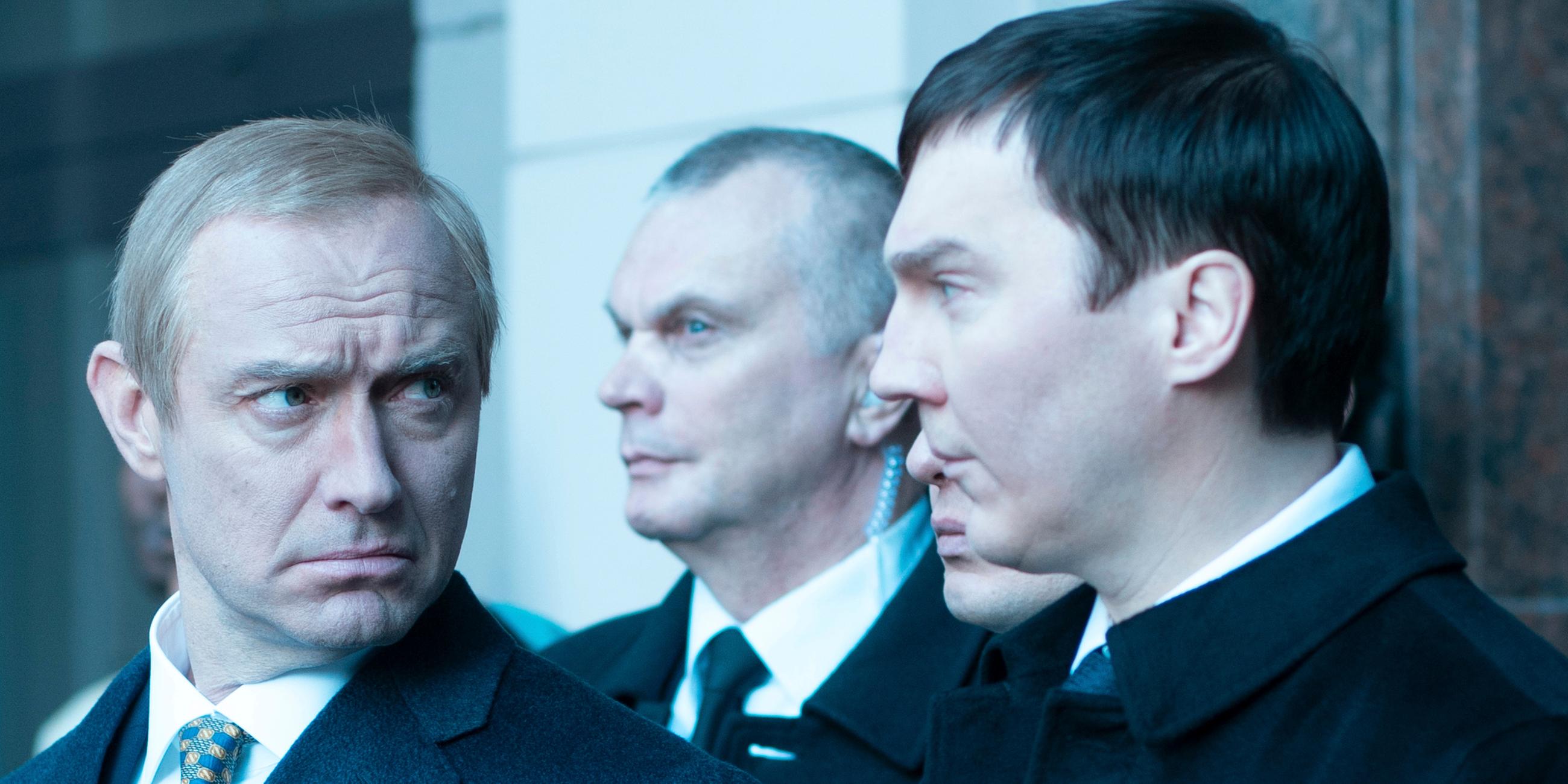 This image shows Jude Law, as Vladimir Putin, left, and Paul Dano, as Vadim Baranov.
