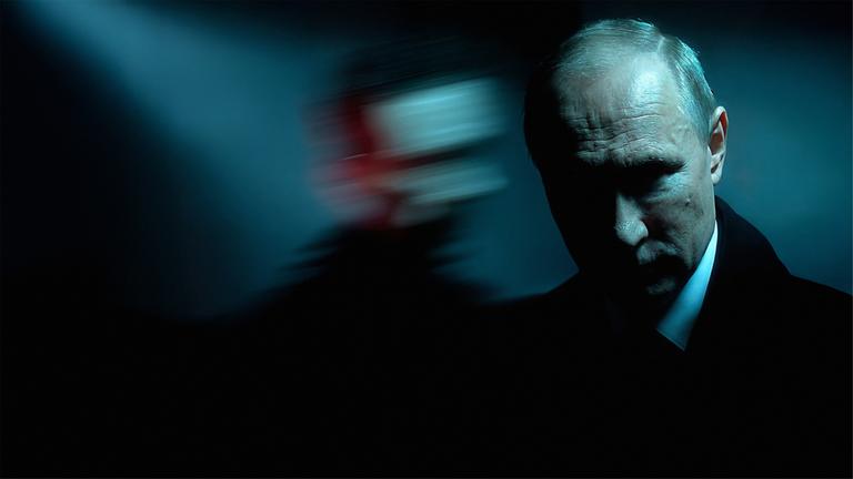 Putin mit einem Schatten im Hintergrund