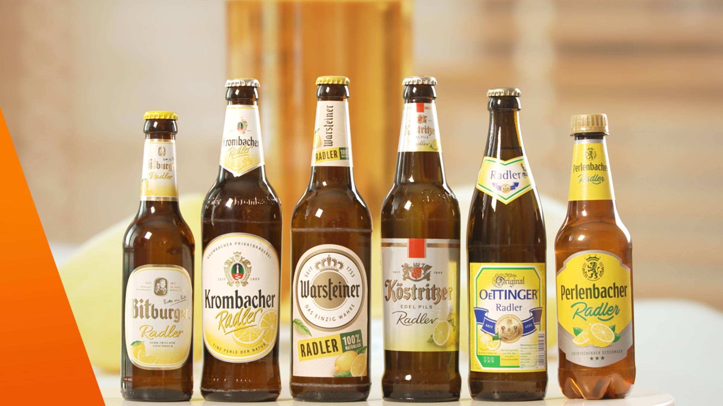 Sechs verschiedene Radler im teuer oder billig-Vergleich