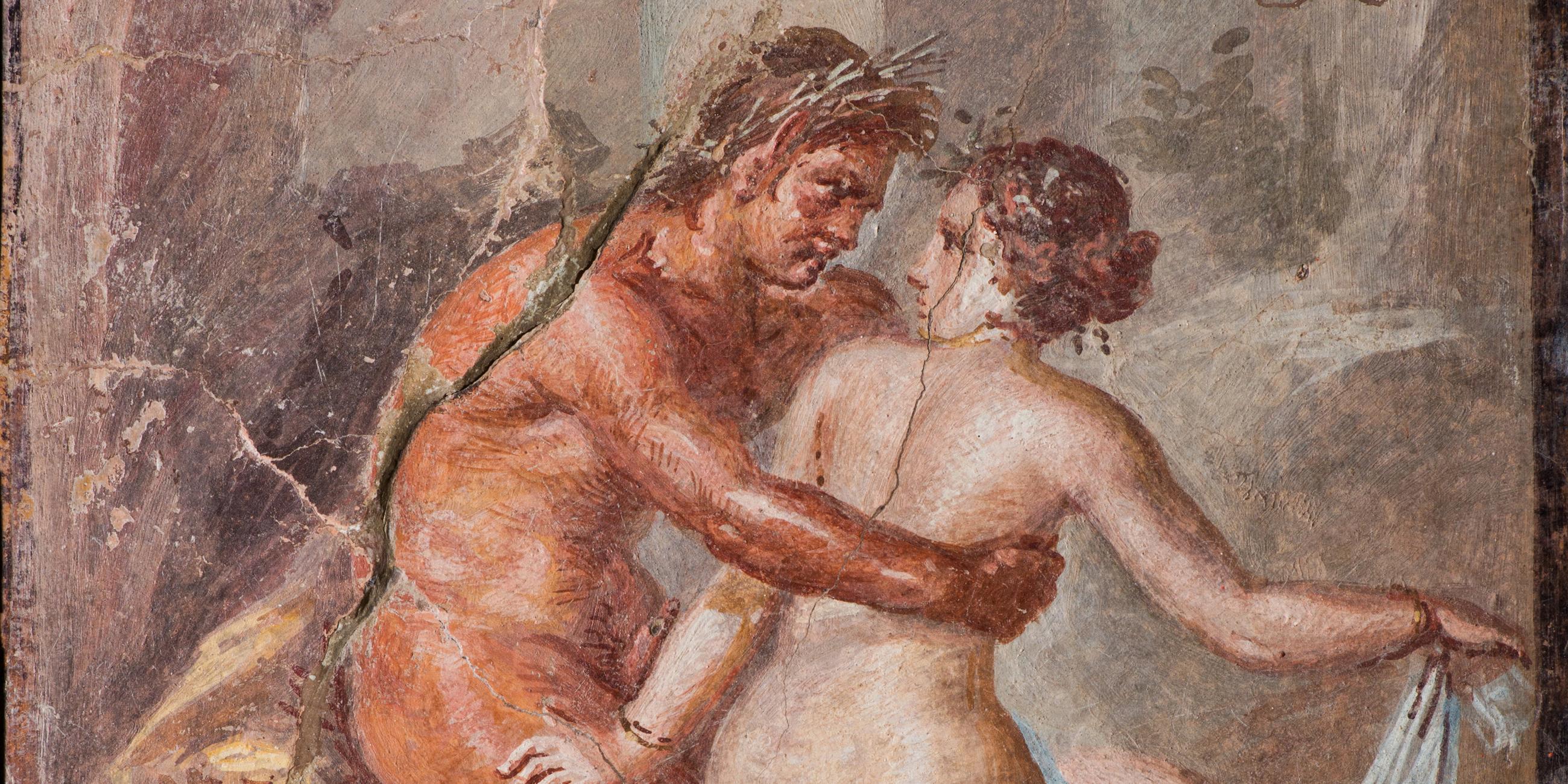 Satyr umarmt eine Nymphe.