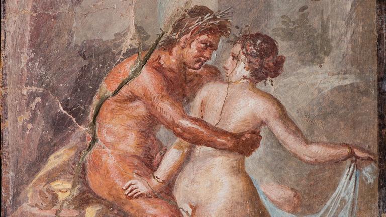 Satyr umarmt eine Nymphe.