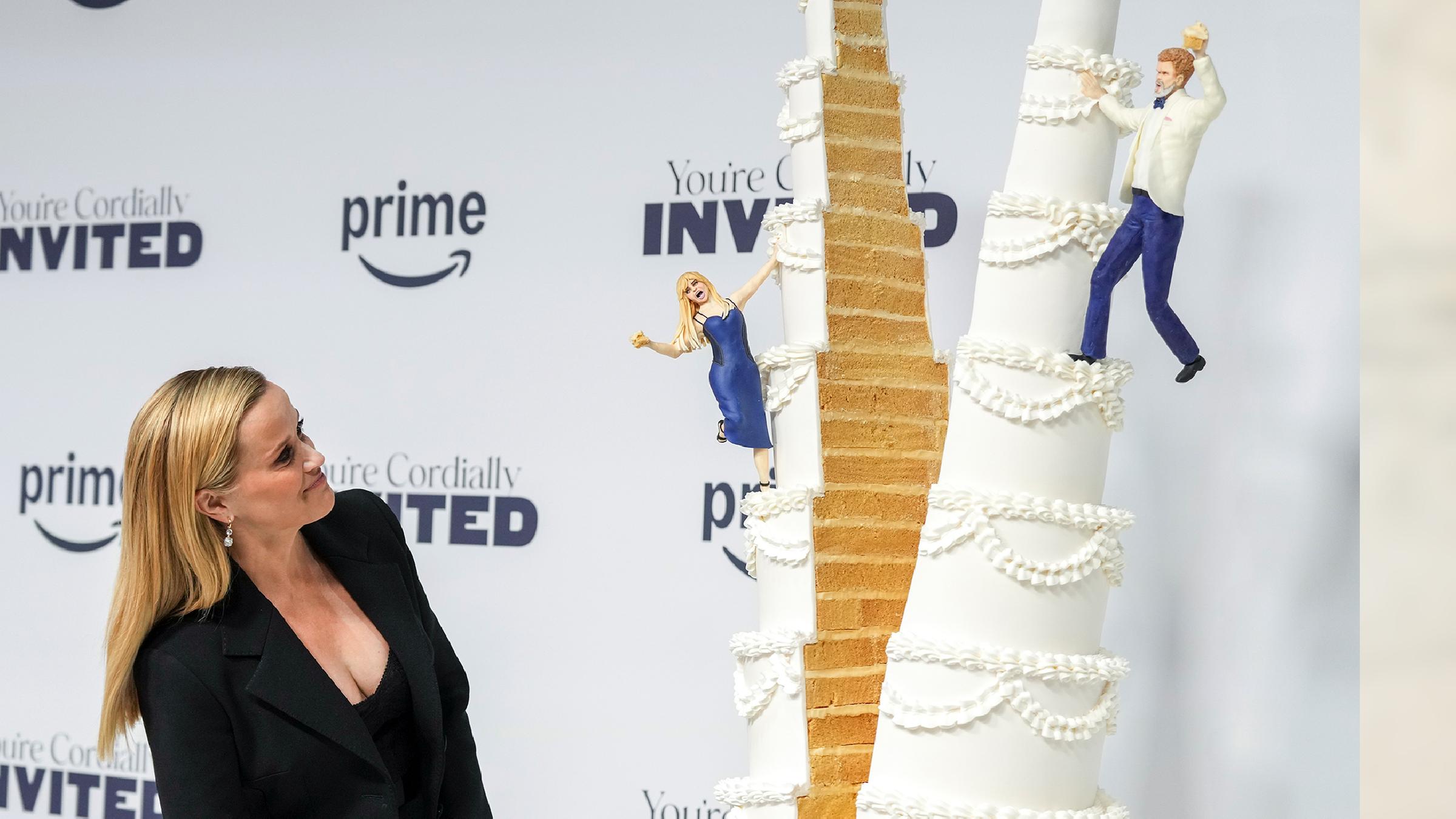 Reese Witherspoon und ihre riesige Torte bei der Premiere ihres neuen Films "Ihr seid herzlich eingeladen".