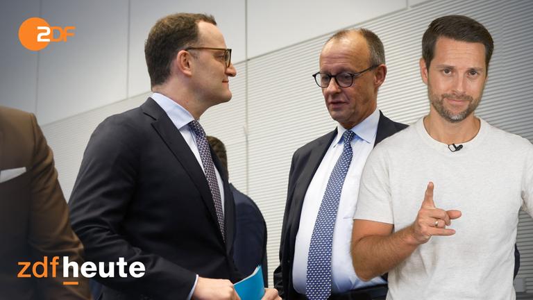 Jens Spahn und Friedrich Merz stehen sich gegenüber und machen ein nachdenkliches Gesicht. Im Vordergrund rechts ist Mirko Drotschamann zu sehe, er hebt einen Finger, um den Rentenstreit der Union zu einzuordnen