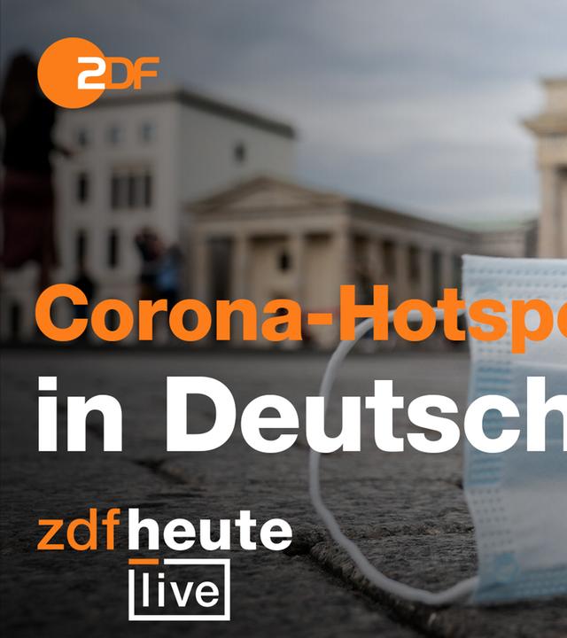 Ein Mund-Nasenschutz vor dem Brandenburger Tor in Berlin