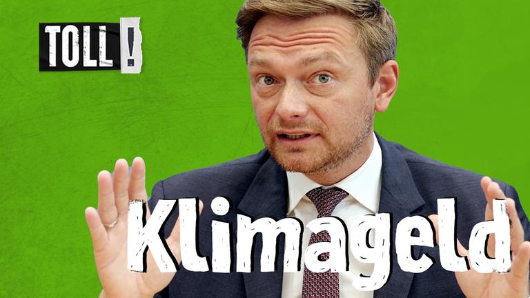Christian Lindner hält zwischen den Händen den Schriftzug "Klimageld"