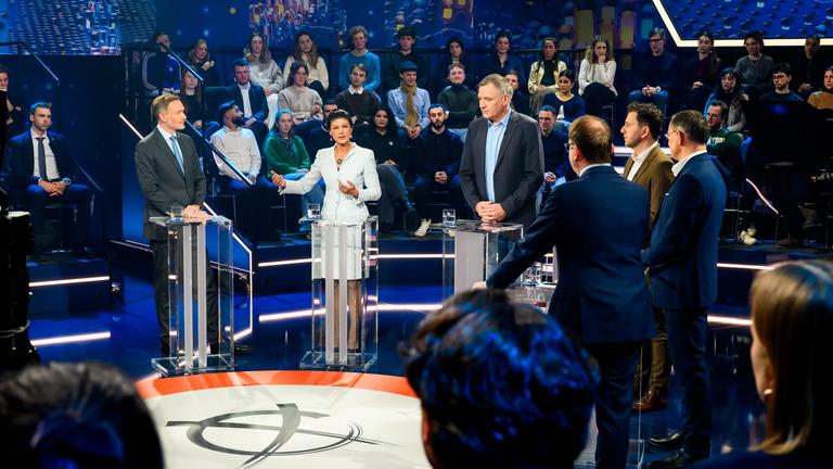Christian Lindner, Sahra Wagenknecht, Jan Van Aken, Alexander Dobrindt, Felix Banaszak und Tino Chrupalla.