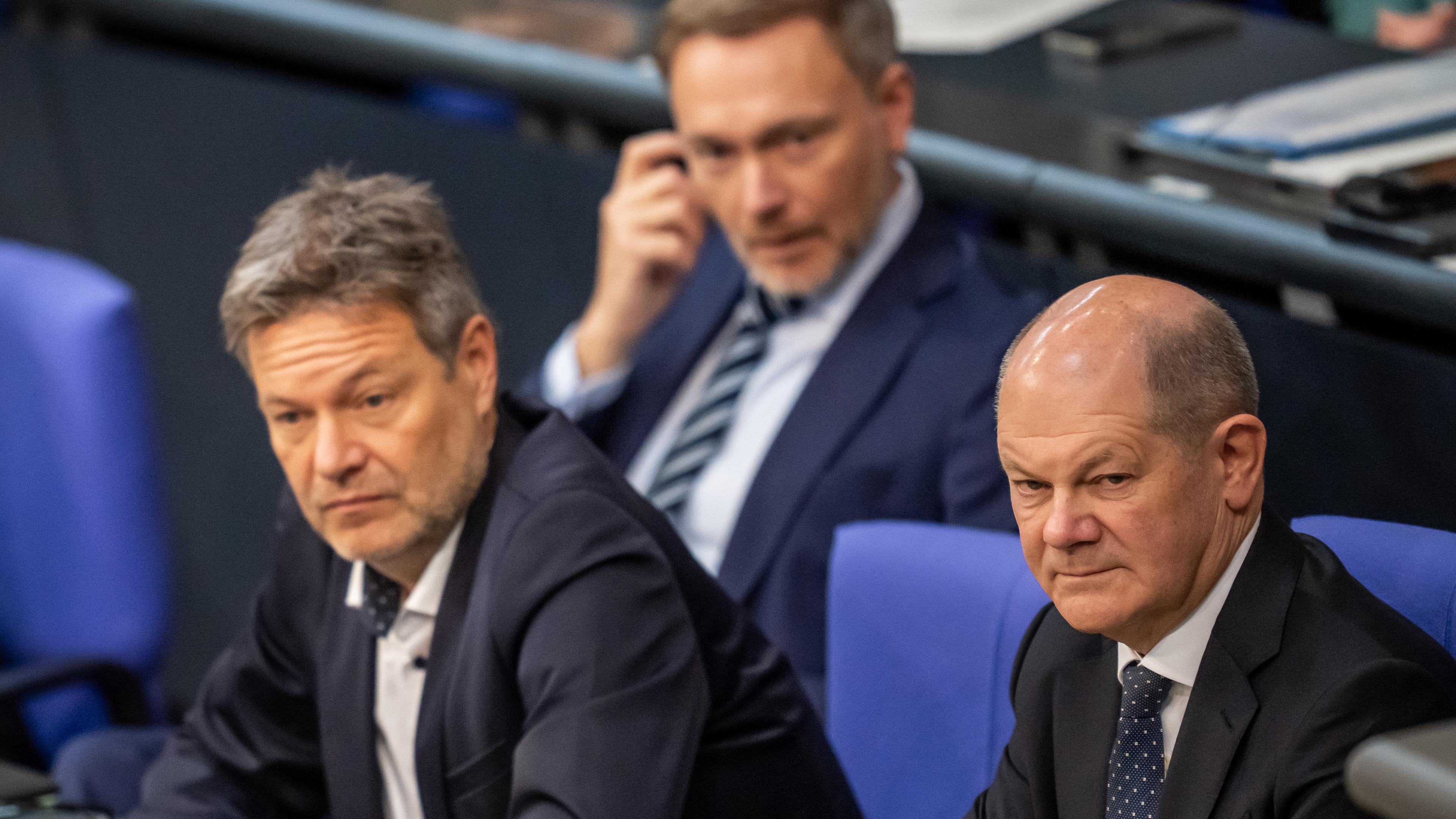 Berlin: Olaf Scholz, Robert Habeck und Christian Lindner