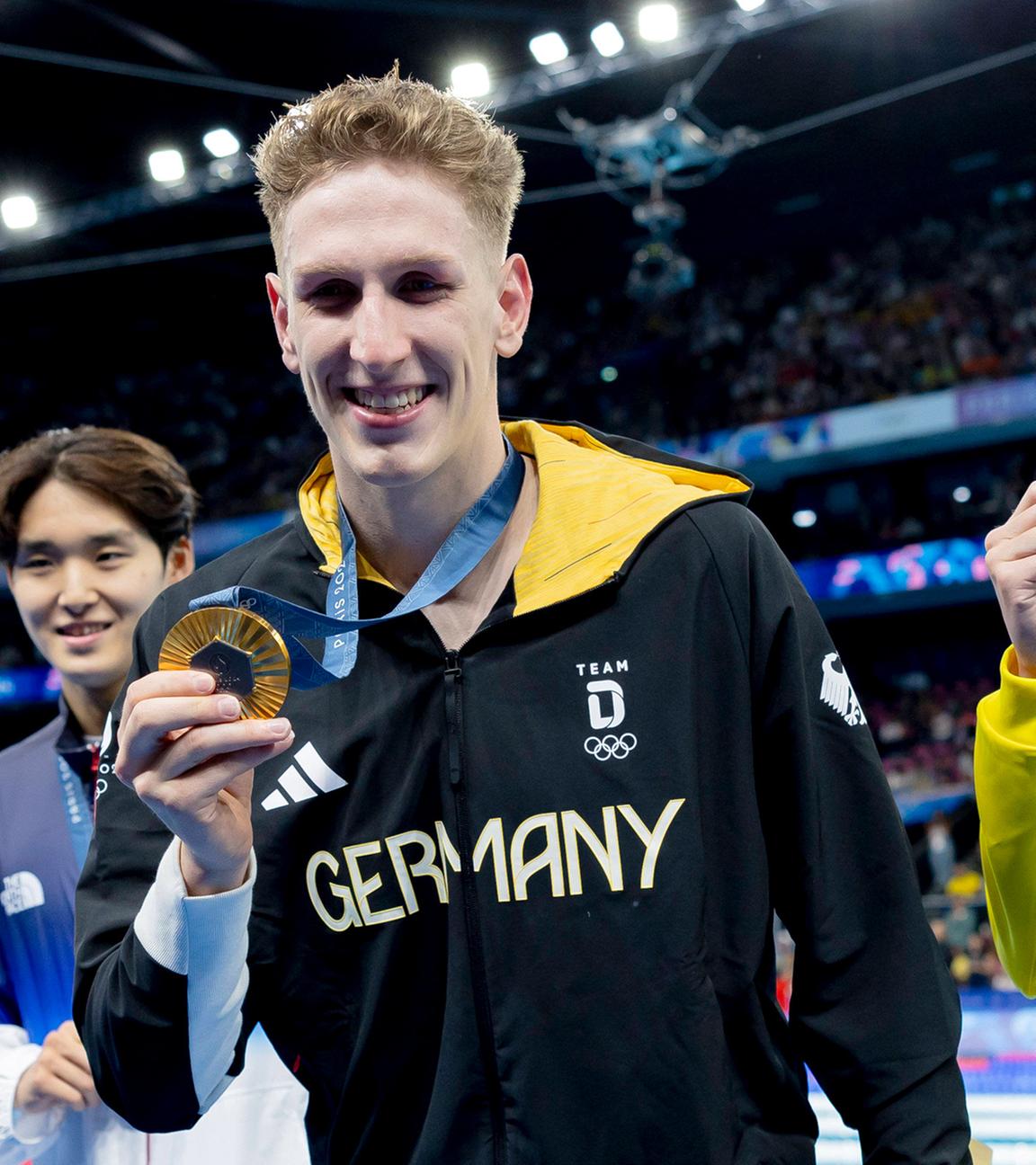  Woomin Kim (KOR), Lukas Märtens (GER) und  Elijah Winnington (AUS) bei der Siegerehrung.
