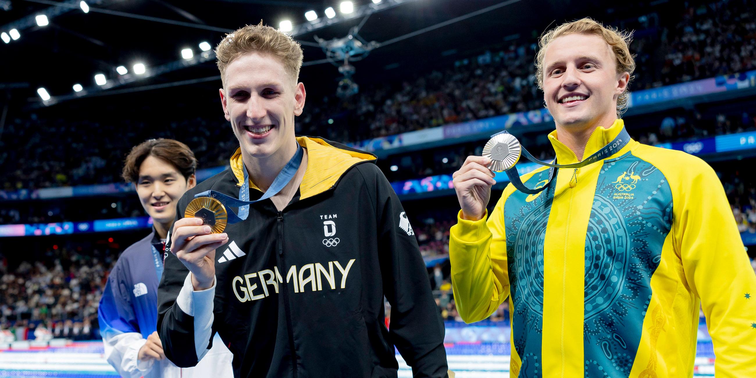  Woomin Kim (KOR), Lukas Märtens (GER) und  Elijah Winnington (AUS) bei der Siegerehrung.