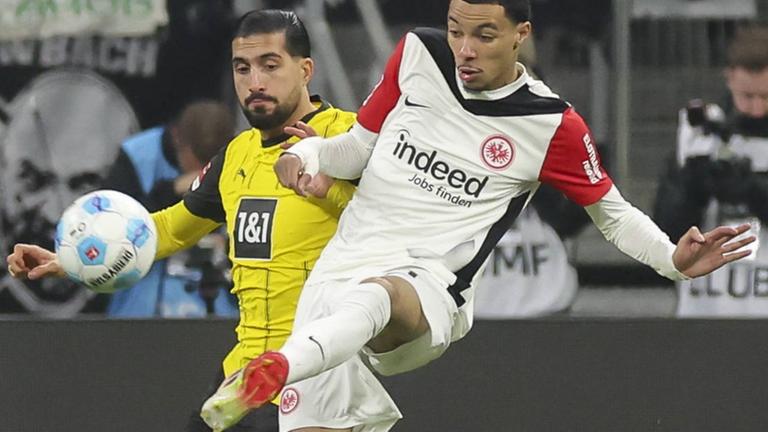 Hugo Ekitike (SGE) und Emre Can (BVB)