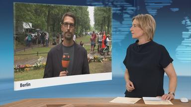 Schaltgespräch mit Carsten Behrendt und Moderation.