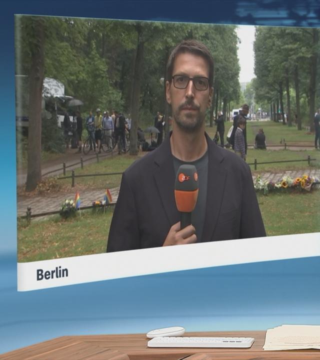 Schaltgespräch mit Carsten Behrendt und Moderation.