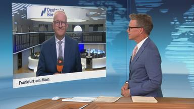 Moderator im Schaltgespräch mit ZDF-Börsenexperte Frank Bethmann
