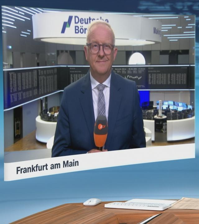 Moderator im Schaltgespräch mit ZDF-Börsenexperte Frank Bethmann