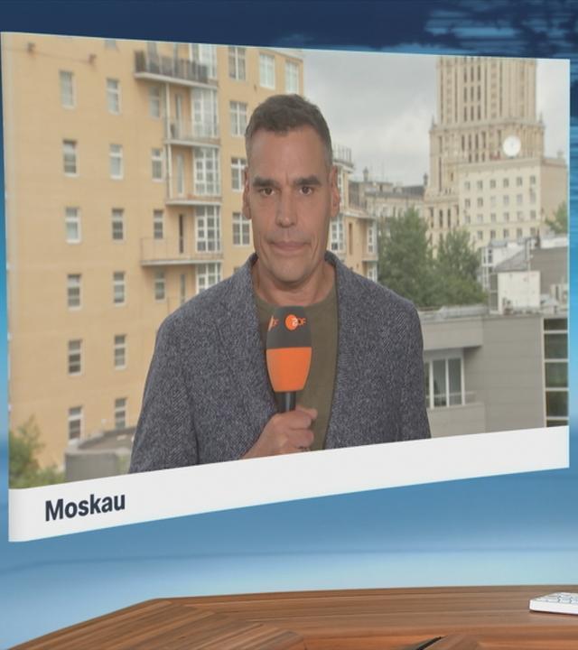 Moderatorin im Schaltgespräch mit Korrespondent Armin Coerper