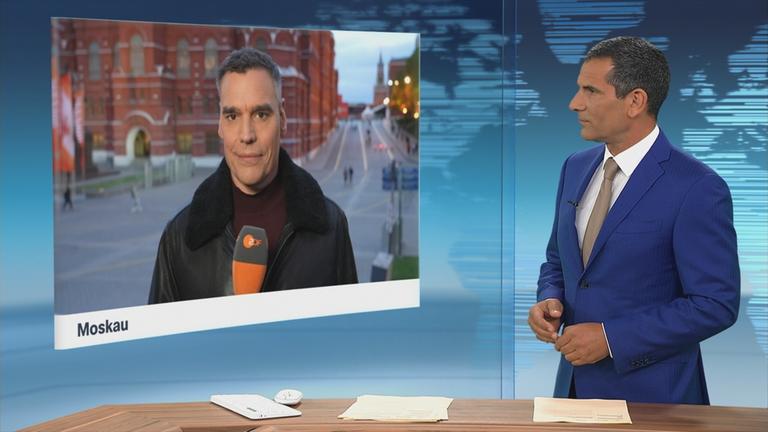 Standbild Schaltgespräch Moderator mit Armin Coerper in Moskau