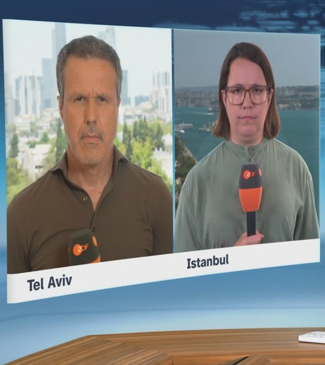 ZDF-Korrespondent Thomas Reichart und ZDF-Korrespondentin Phoebe Gaa berichten ins ZDFheute-Studio.