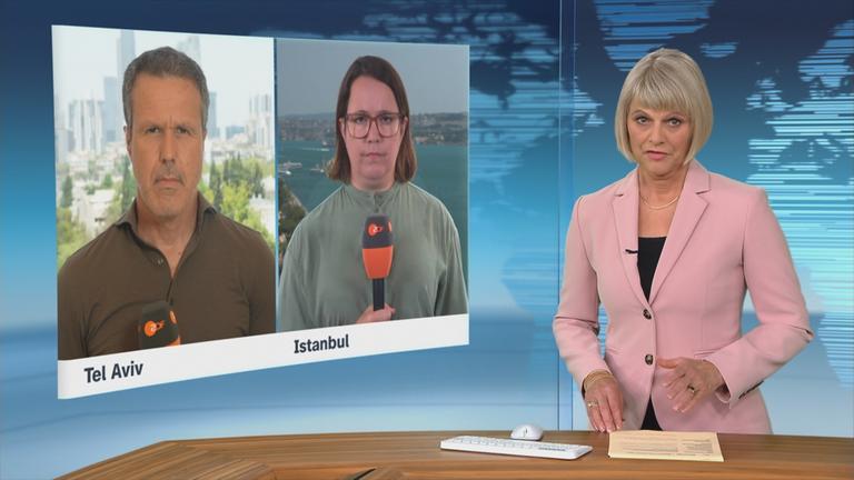 ZDF-Korrespondent Thomas Reichart und ZDF-Korrespondentin Phoebe Gaa berichten ins ZDFheute-Studio.