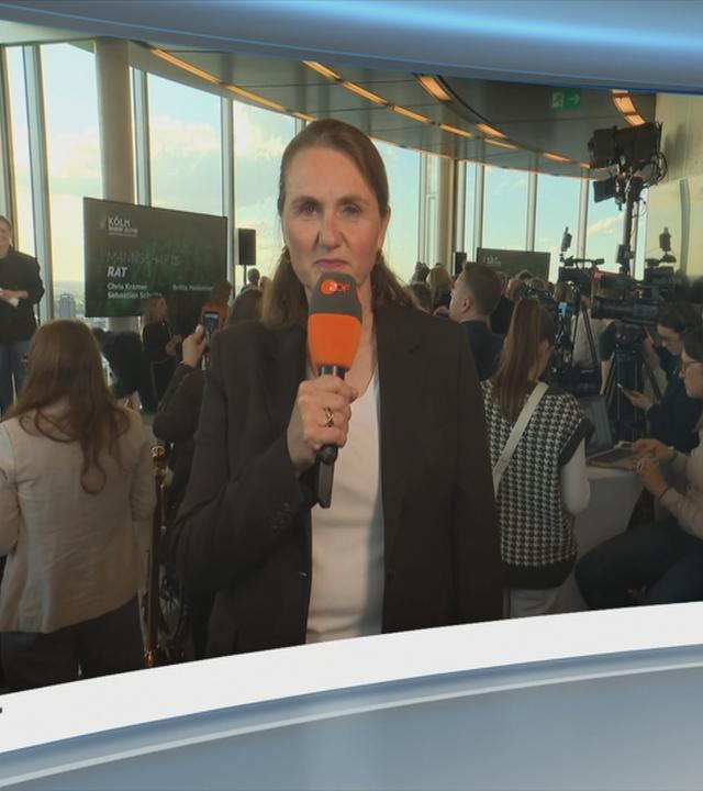 Moderatorin im Schaltgespräch mit ZDF-Reporterin Ina Baltes