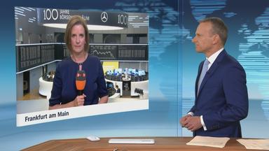 Moderator im Schaltgespräch mit ZDF-Börsenexpertin Valerie Haller