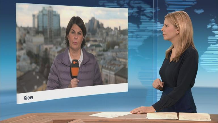 Darauf ist Anne Brühl zu sehen. Sie berichtet live aus Kiew
