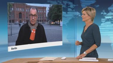 Moderatorin im Schaltgespräch mit ZDF-Korrespondent Stephan Merseburger