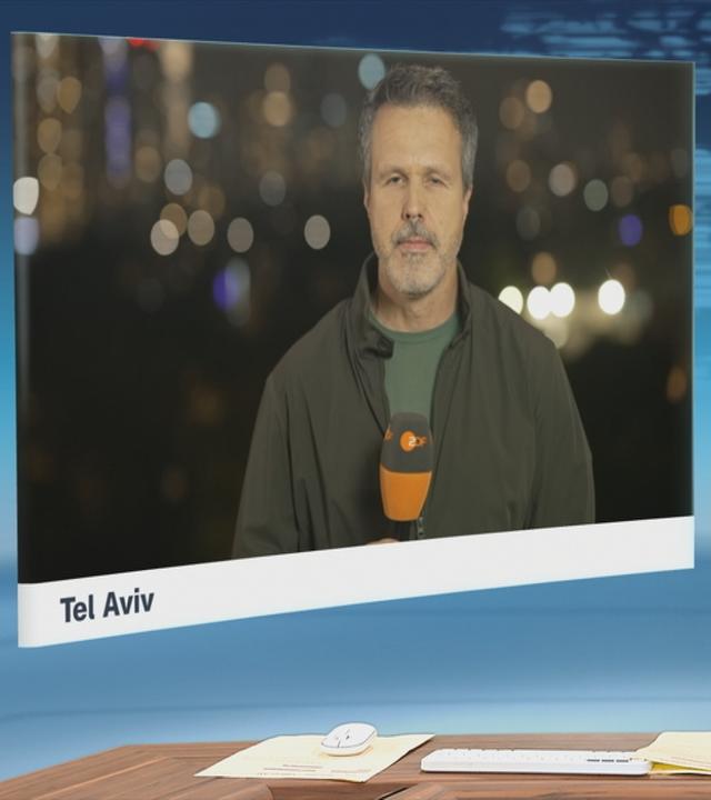 Moderator im Schaltgespräch mit Korrespondent Thomas Reichart