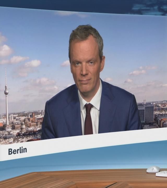 Moderatorin im Schaltgespräch mit ZDF-Wirtschaftsexperte Florian Neuhann