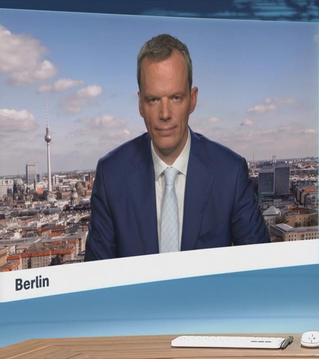 Moderatorin im Schaltgespräch mit ZDF-Börsenexperte Florian Neuhann