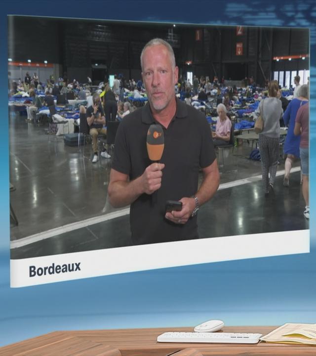 Moderator im Schaltgespräch mit ZDF-Reporter Martin Niessen