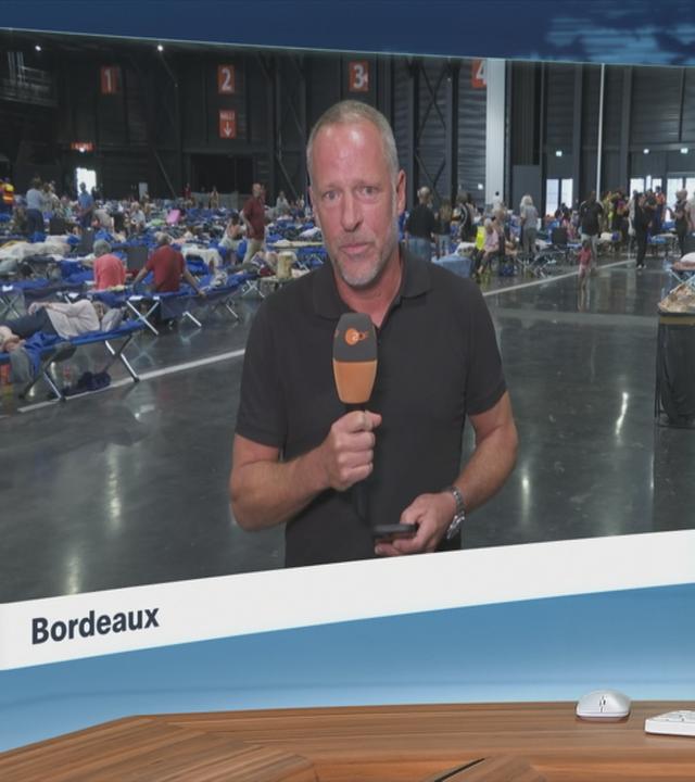 Moderatorin im Schaltgespräch mit ZDF-Reporter Martin Niessen