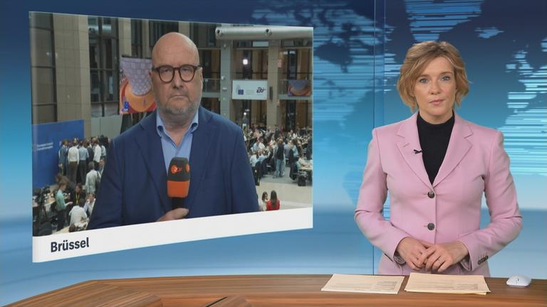 Moderatorin und Ulf Röller zugeschaltet