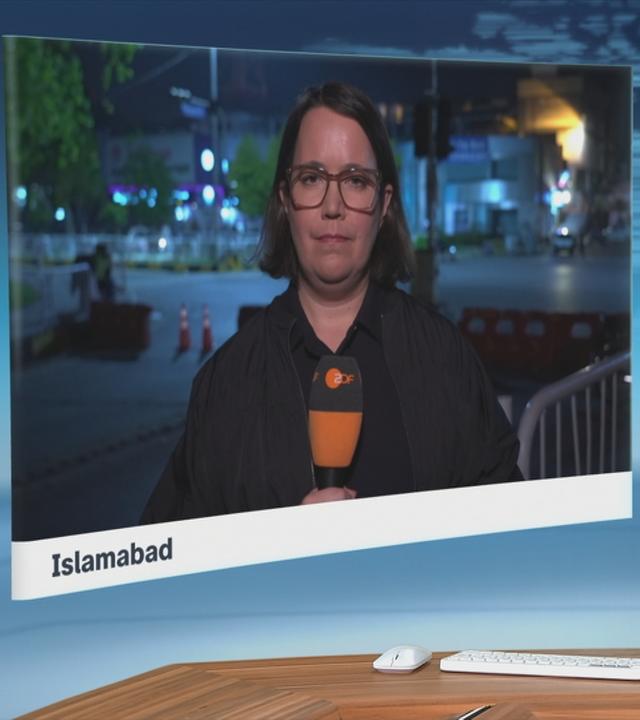 Moderator im Schaltgespräch mit ZDF-Korrespdonentin Phoebe Gaa