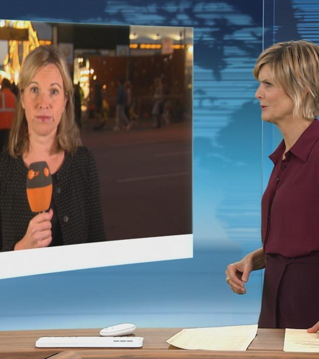Nachdem das Münchner Oktoberfest wegen einer Bombendrohung zwischenzeitlich schließen musste, hat es nun wieder geöffnet. Eva Schiller berichtet über die Stimmung vor Ort.