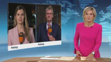 Die ZDF-Korrespondenten Elisabeth Schmidt und Elmar Theveßen