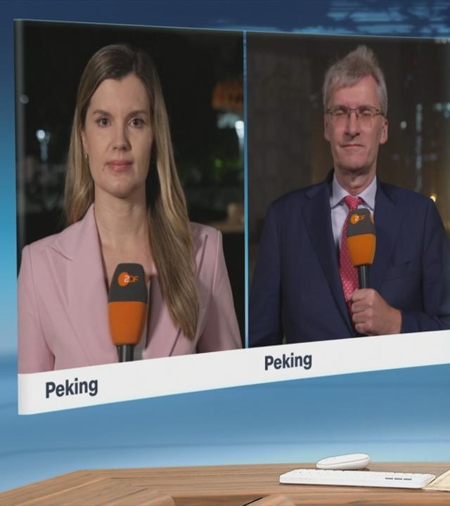 Die ZDF-Korrespondenten Elisabeth Schmidt und Elmar Theveßen
