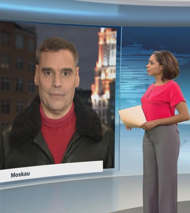 ZDF-Korrespondenten Schmiese und Coerper bei einem Schaltgespräch