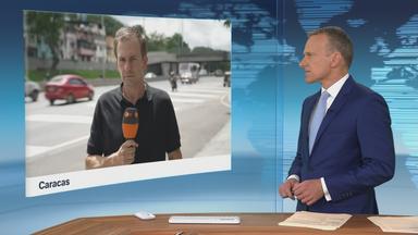 Moderator im Schaltgespräch mit ZDF-Korrespondent Christian Semm