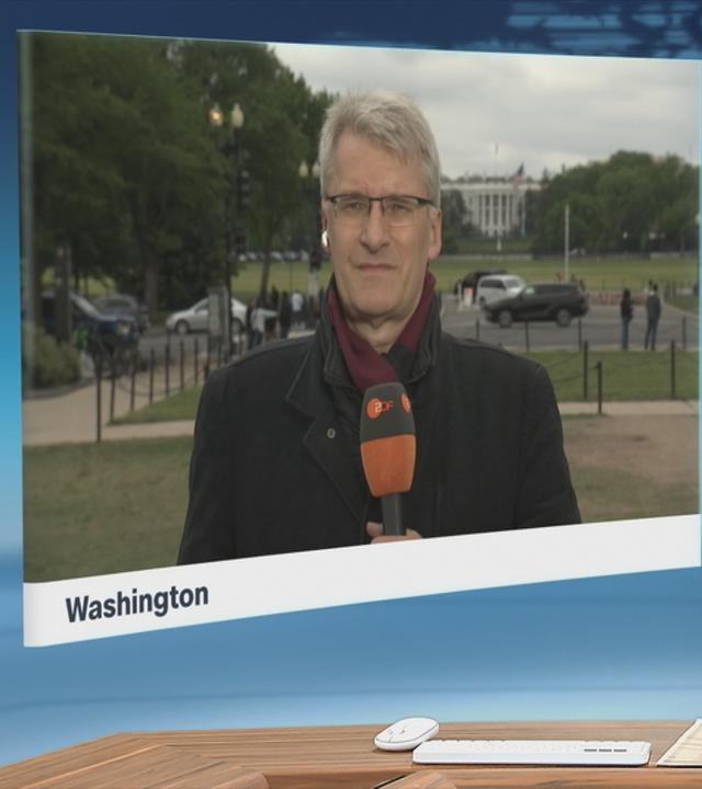 Schaltgespräch mit Elmar Theveßen und Moderation.