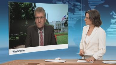 Schaltgespräch mit Elmar Theveßen und Moderation.