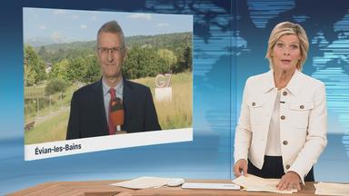 Moderatorin im Schaltgespräch mit ZDF-Korrespondent Elmar Theveßen