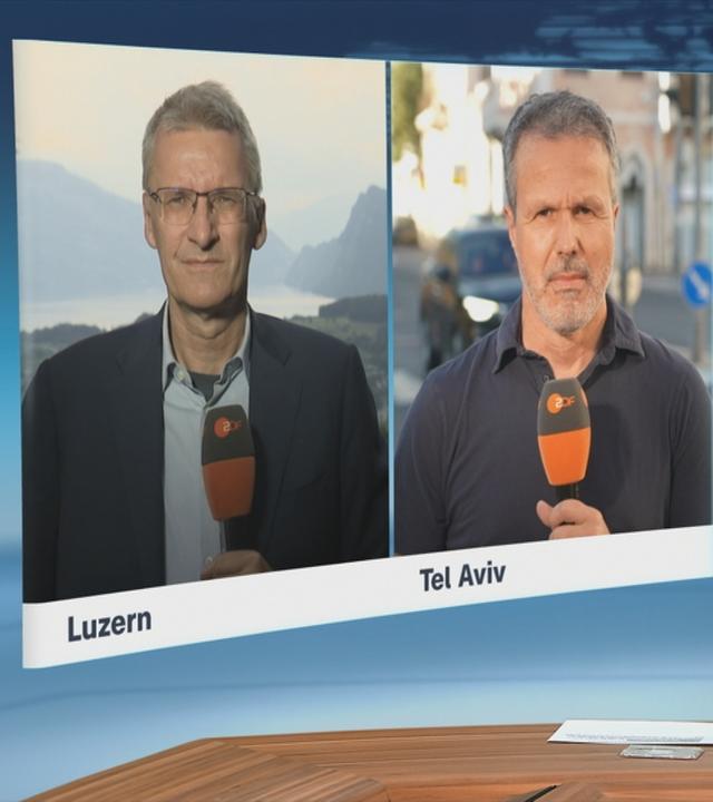 Die ZDF-Korrespondenten Elmar Theveßen und Thomas Reichart 