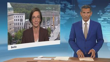 Moderator im Schaltgespräch mit ZDF-Hauptstadtkorrespondentin Diana Zimmermann